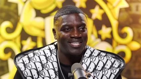 akon wears fake dior|akon drio sweater.